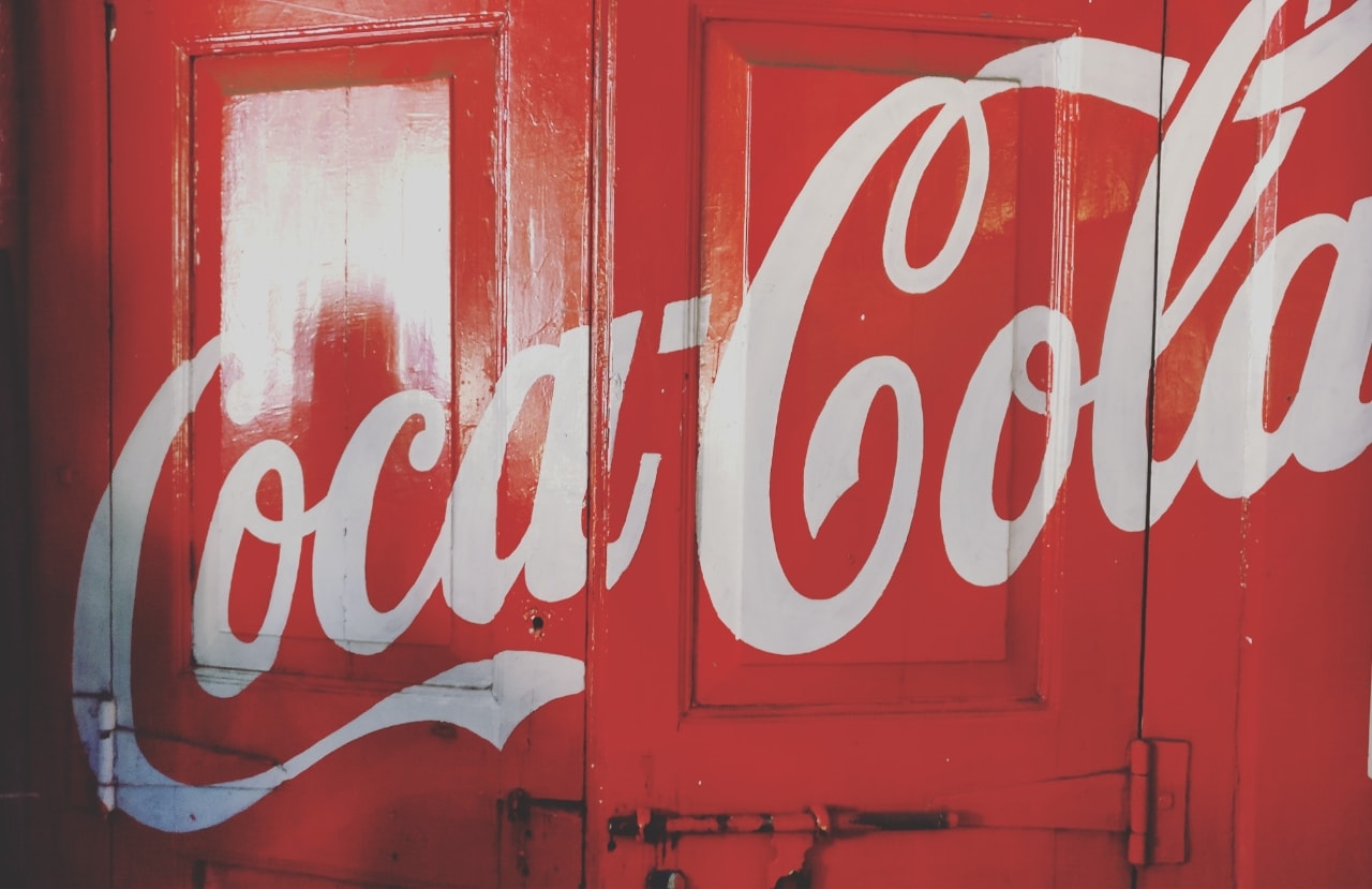 CocaCola's logo on a red door
